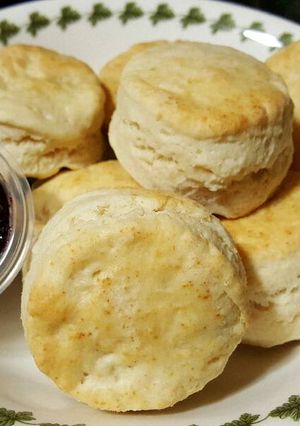 A picture of Biscuit with blueberry jam.