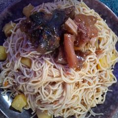 A picture of Suppergetti and Irish with cow leg.