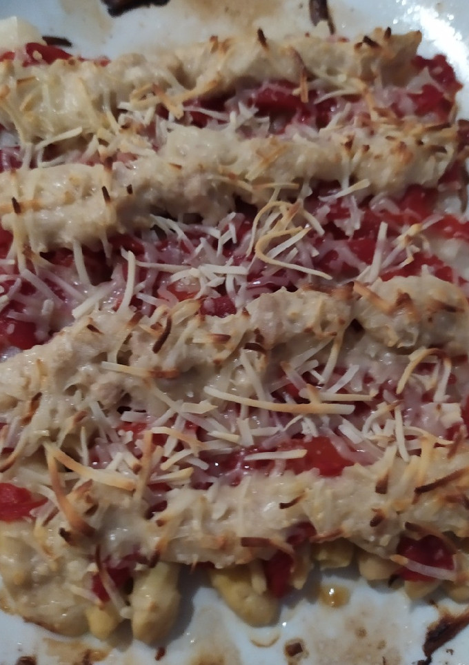 Una foto de Espárragos gratinados con pimientos y atún