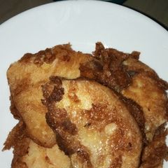 A picture of Fried yam in eggs.