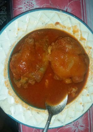 Una foto de Patitas de puerco en mole