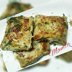 A picture of Cheezy Paneer parcels.