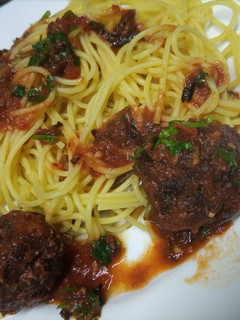 A picture of Tumeric Spaghetti in meatball sauce.