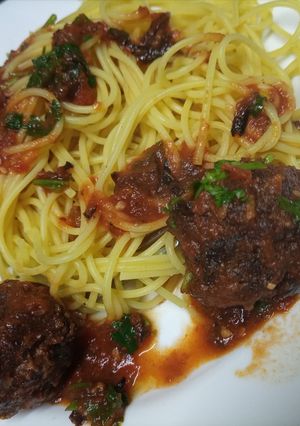 A picture of Tumeric Spaghetti in meatball sauce.