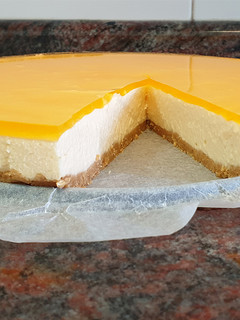 Una foto de Cheesecake de mango