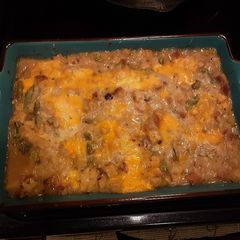 A picture of Creamy almond chicken with asparagus stuffing.