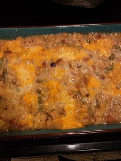 A picture of Creamy almond chicken with asparagus stuffing.