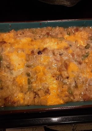 A picture of Creamy almond chicken with asparagus stuffing.