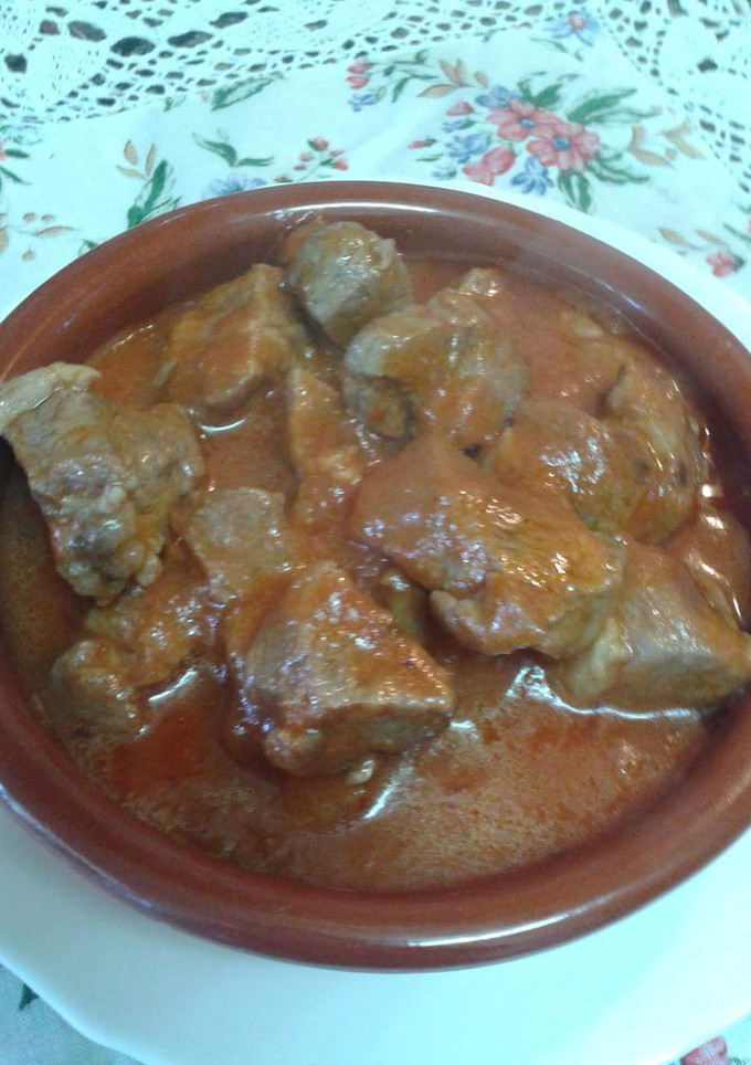Una foto de Magra con tomate