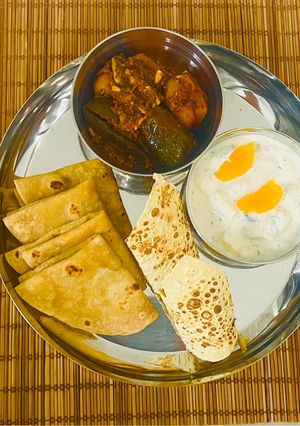 A picture of Mini Kathiyawadi Meal- Bharela (Ravaya)Ringana- Bateta nu Shaak-Fulka Rotli😋.