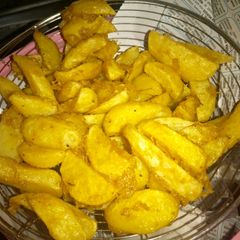 Potato wedges A picture of Potato wedges.