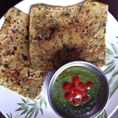A picture of Stuffed cheese fenugreek paratha.