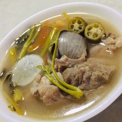 A picture of Pork Ribs & Water Spinach in Tamarind Broth - Filipino Sinigang.