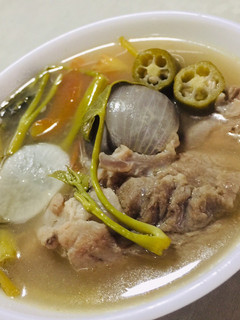 A picture of Pork Ribs & Water Spinach in Tamarind Broth - Filipino Sinigang.