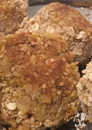 Una foto de Bolitas de calabaza rebozadas con avena y sésamo