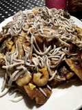 Revuelto de setas de cardo con gulas