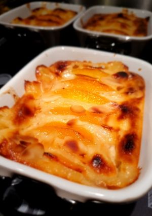Une photo de Pêches gratinées aux amandes