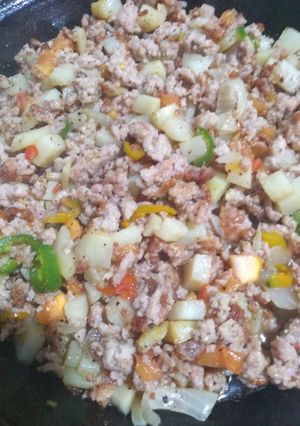 A picture of Pork Picadillo with Pico de Gallo and Potatoes.