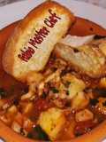 Zuppa di Pesce con tentacoli di calamari e crostini di pane