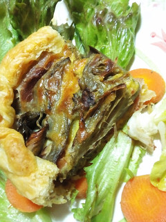 Foto di Torta salata, carciofi, prosciutto crudo, e grana