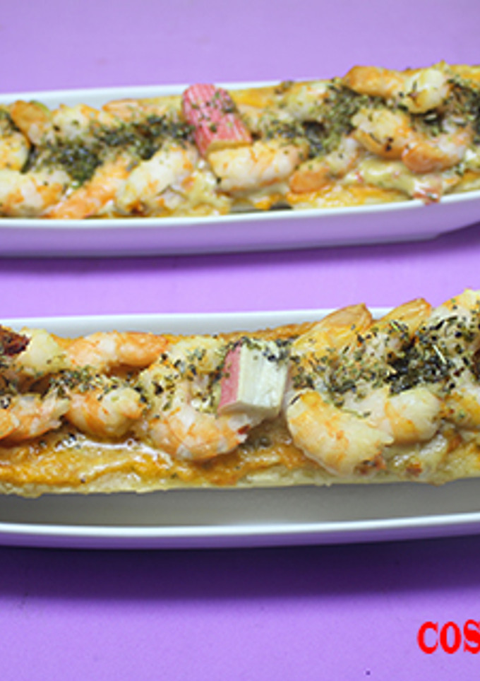 Una foto de Bocadillo de gambas con complejo de pizza