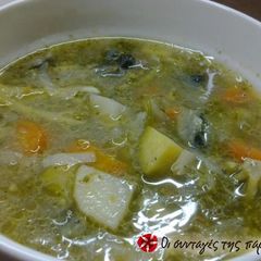 A picture of Multi-colored vegetable soup.