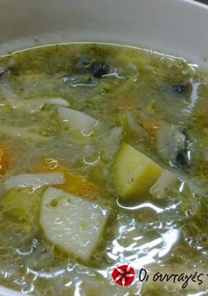 A picture of Multi-colored vegetable soup.
