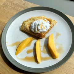 A picture of Mango & coconut yoghurt crepes.
