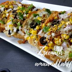 A picture of Pan Slice Bun Veg Pizza.