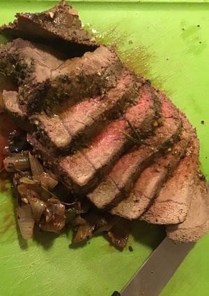 A picture of Garlic and Herb butter crusted Tri Tip Roast.