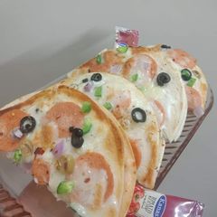 A picture of Cheesy pizza sandwich.