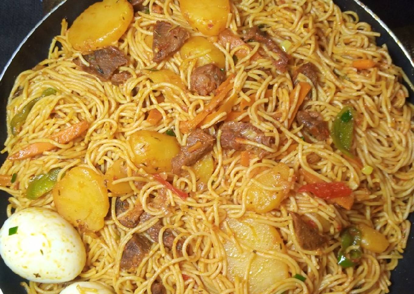Fried spaghetti and potatoes
