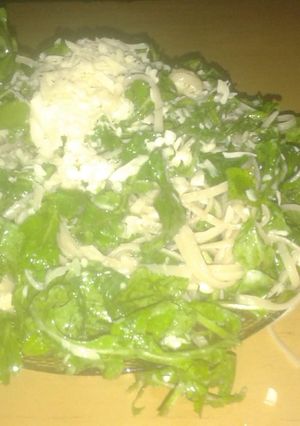 Una foto de Linguine con rúcula y queso parmesano