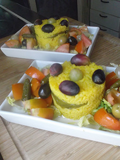 Una foto de Tartar de arroz, pimientos y uvas
