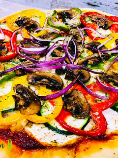 Una foto de Pizza de verduras