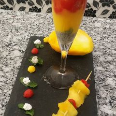 A picture of Mango smoothie combine with watermelon pulp.