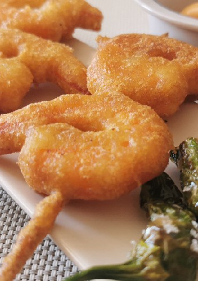 Una foto de Brocheta de Buñuelos de Langostinos