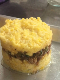 Una foto de Puré de papa relleno carne mechada