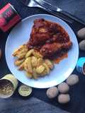 Hähnchenkeulen in Tomaten-Balsamico-Sauce mit Kartoffelspalten