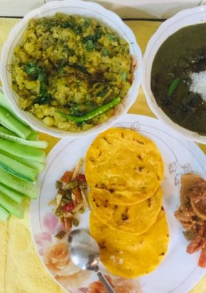 A picture of Sarson Ka Saag,Makki Ki Rotis, turnips Bhaji,hot dry fruits Gur.