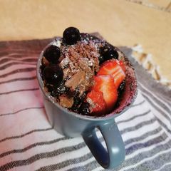 A picture of Chocolate Cake in a mug.