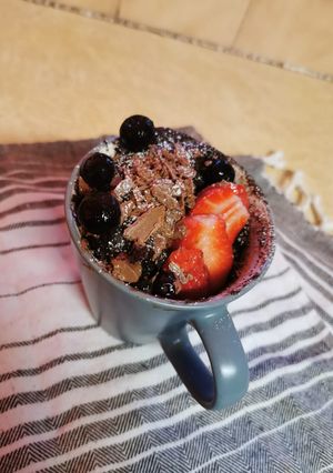 A picture of Chocolate Cake in a mug.