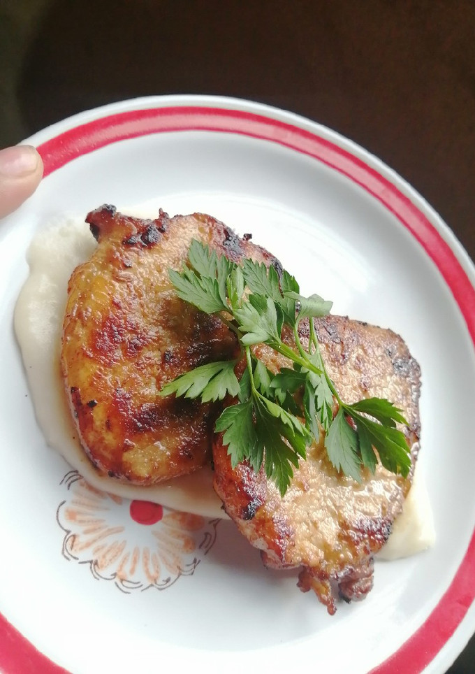 Una foto de Lomo de cerdo a la naranja con bechamel