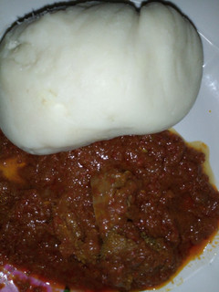 A picture of Pounded yam with soup.