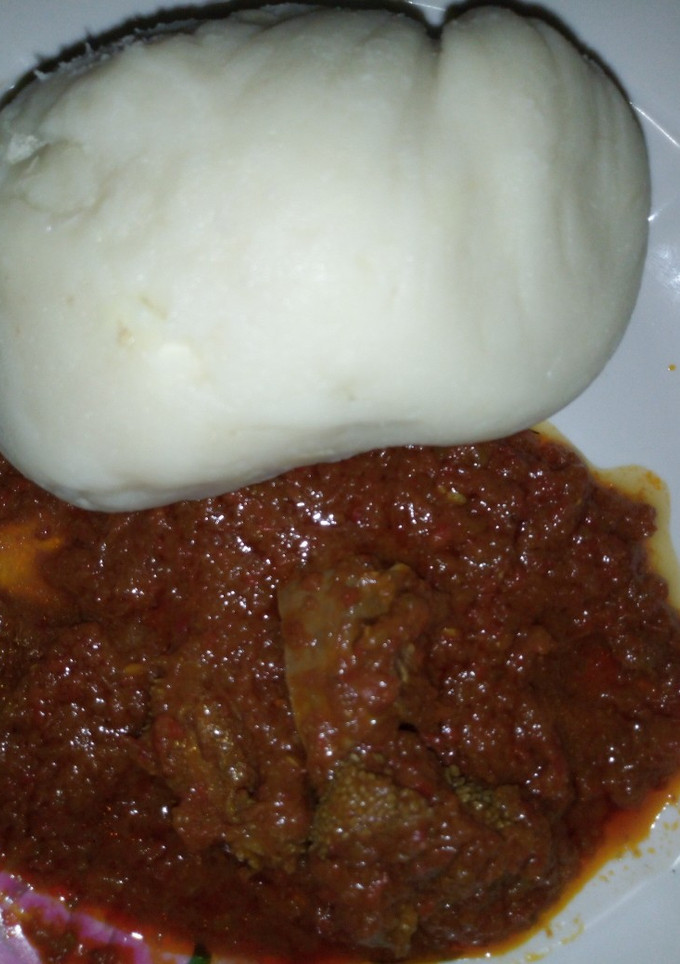 A picture of Pounded yam with soup.