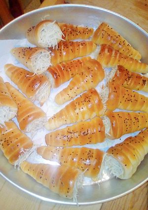 صورة لوصفة لي كورني مالحين بالعجينة السحرية