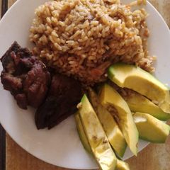 Jollof rice chi chicken with apple A picture of Jollof rice chi chicken with apple.