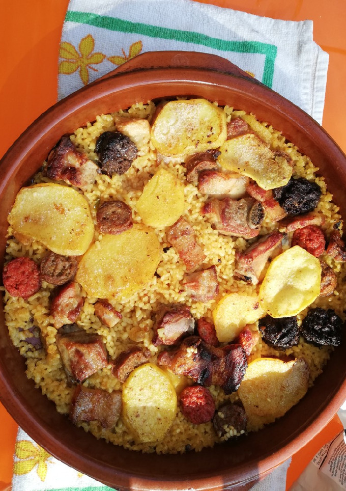 Una foto de Arros al forn