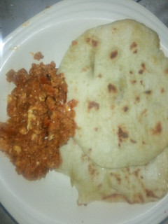 A picture of Chapatti with egg sauce.