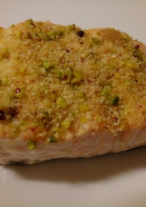 A picture of Salmon with a pistachio and red pepper crust.
